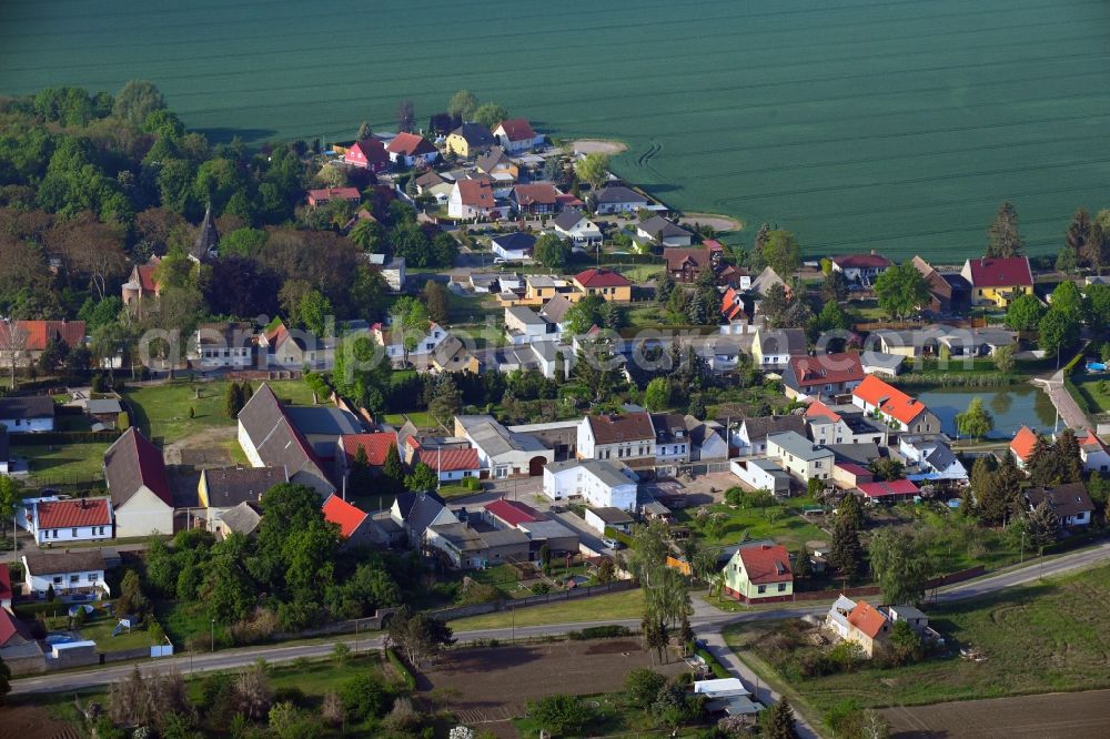 Aerial photograph Poley - Agricultural land and field borders surround the settlement area of the village in Poley in the state Saxony-Anhalt, Germany