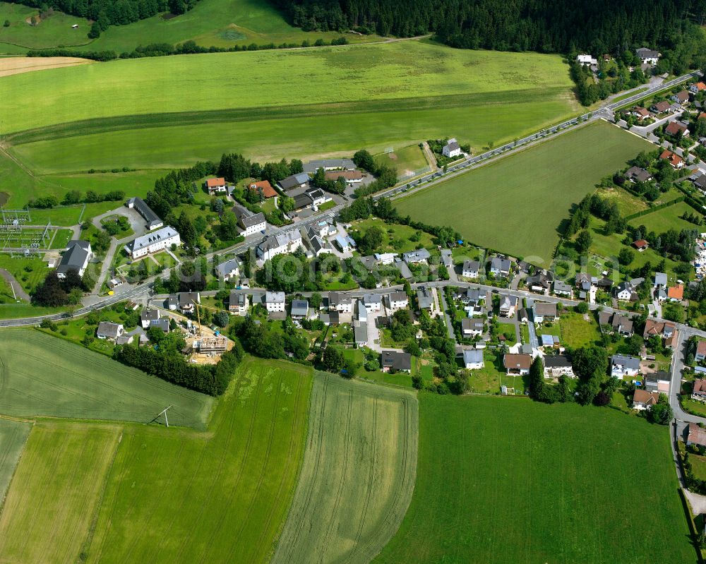 Aerial photograph Jägersruh - Agricultural land and field boundaries with the power plants surround the settlement area of the village in Jägersruh in the state Bavaria, Germany