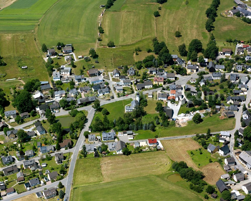 Langenbach from above - Agricultural land and field boundaries with the power plants surround the settlement area of the village in Langenbach in the state Bavaria, Germany