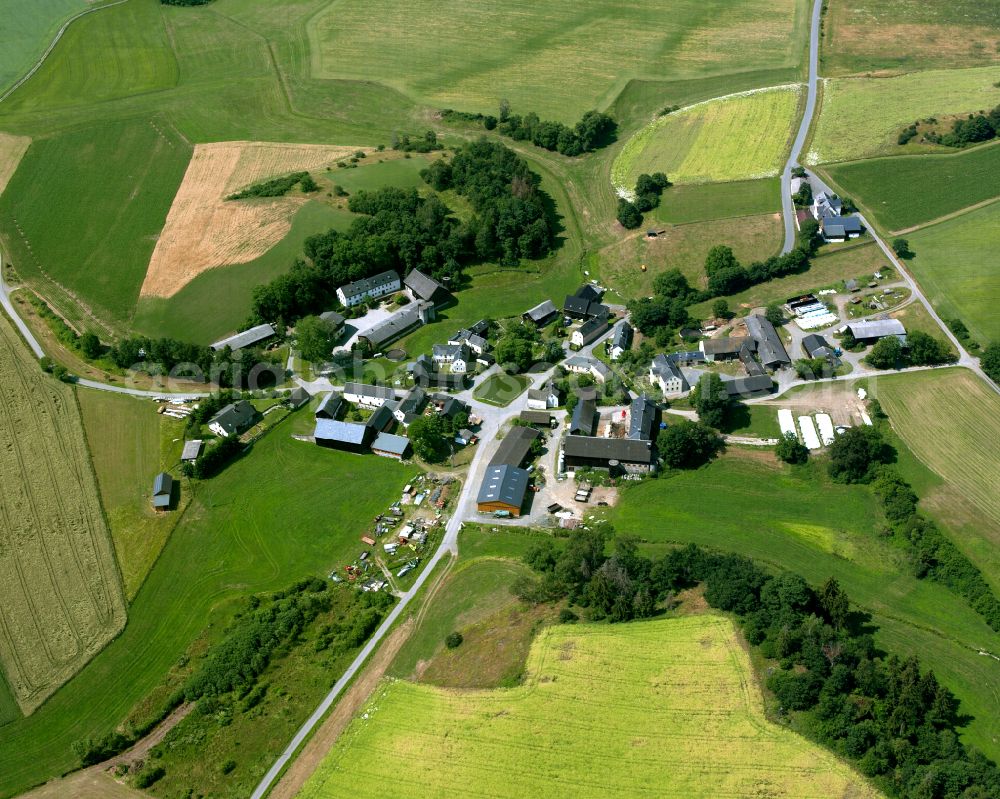 Aerial photograph Oberhartmannsreuth - Agricultural land and field boundaries with the power plants surround the settlement area of the village in Oberhartmannsreuth in the state Bavaria, Germany