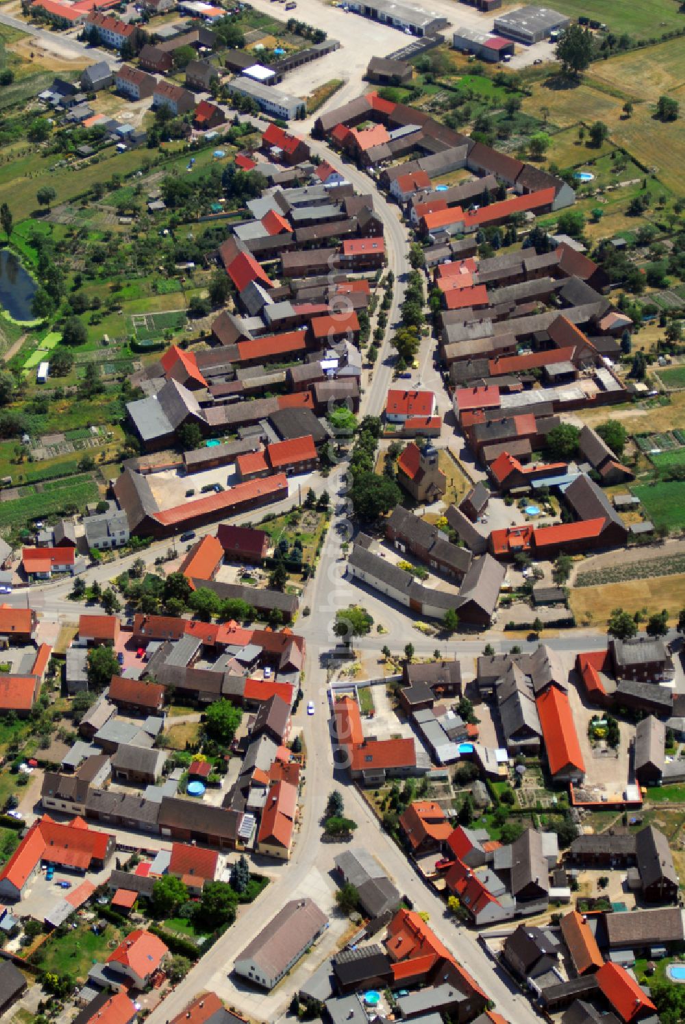 Aerial image Selbitz - Agricultural land and field boundaries with the power plants surround the settlement area of the village on street Dorfstrasse in Selbitz in the state Saxony-Anhalt, Germany