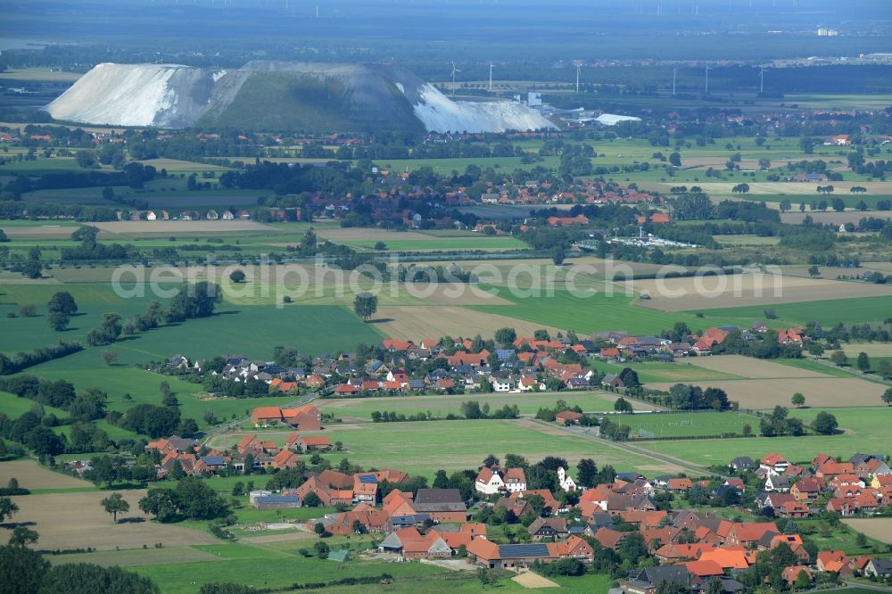 Aerial photograph Rehren Nordbruch - View on the village core of Rehren and Nordbruch plus the potash works Sigmundshall by the company K+S KALI GmbH in the state Lower Saxony. In front of the potash works are parts of the villages Idensen and Mesmerode