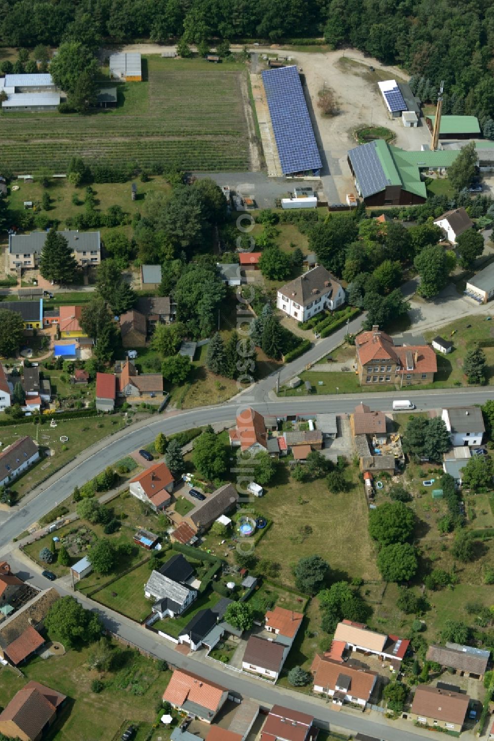 Sallgast from the bird's eye view: Village core of Sallgast in the state of Brandenburg. View of residential houses and small farms along Finsterwalder Strasse