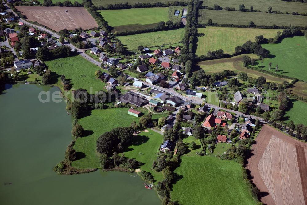 Borgdorf from above - Village on the lake bank areas of Borgdorfer Lake in Borgdorf in the state Schleswig-Holstein