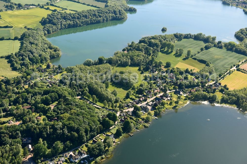 Aerial photograph Niederkleveez - Village on the lake bank areas of Diecksees in Niederkleveez in the state Schleswig-Holstein, Germany