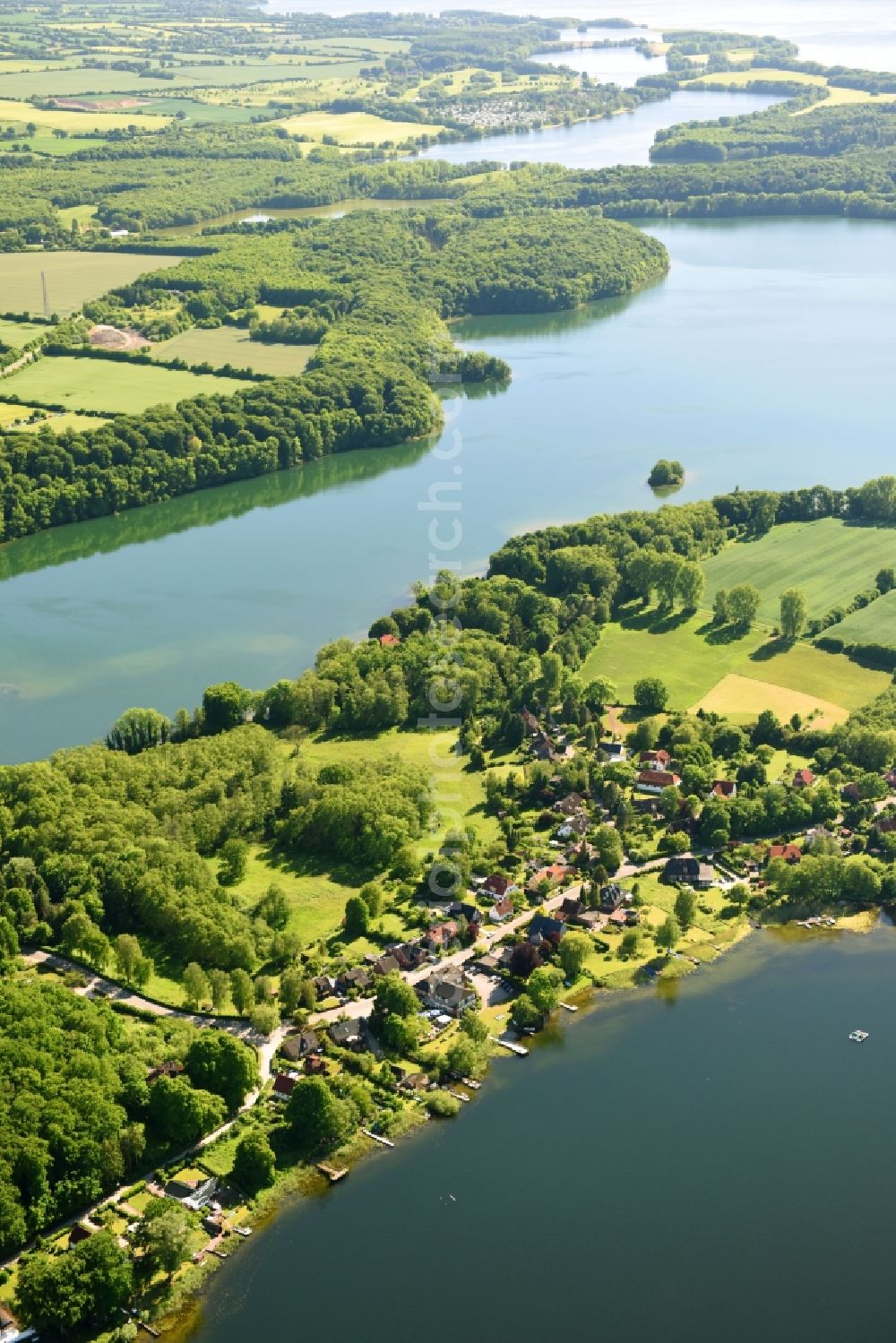 Niederkleveez from above - Village on the lake bank areas of Diecksees in Niederkleveez in the state Schleswig-Holstein, Germany