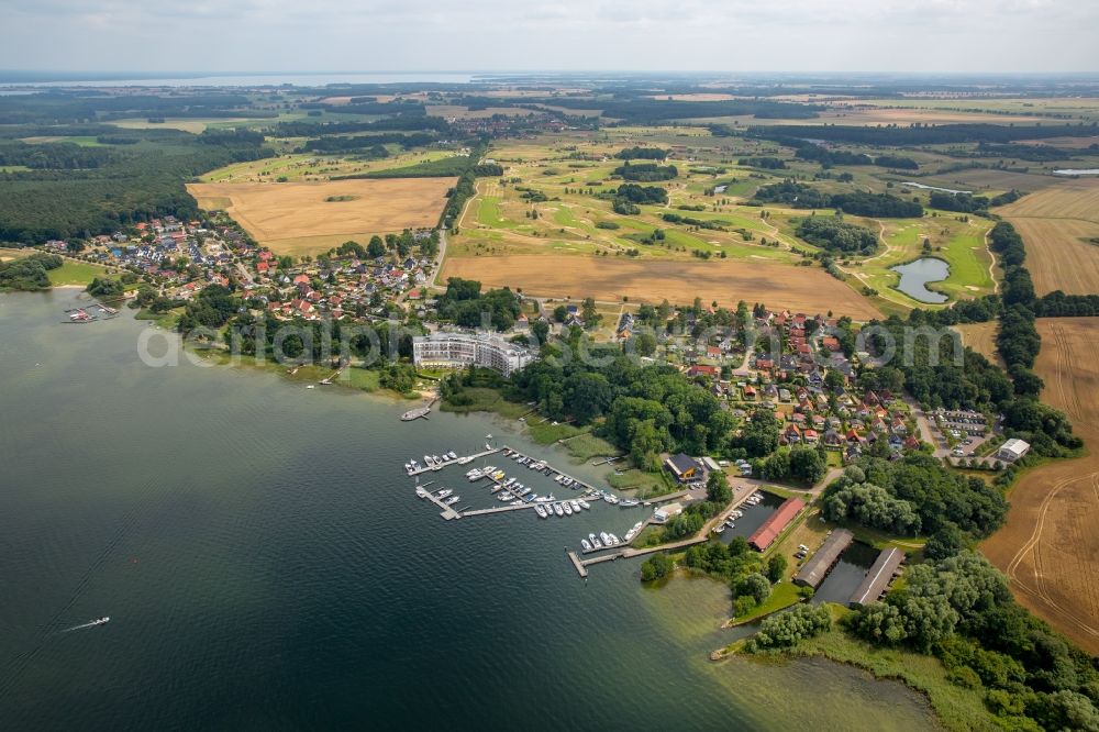 Aerial image Untergöhren - Village on the lake bank areas of Fleesen lake in Untergoehren in the state Mecklenburg - Western Pomerania