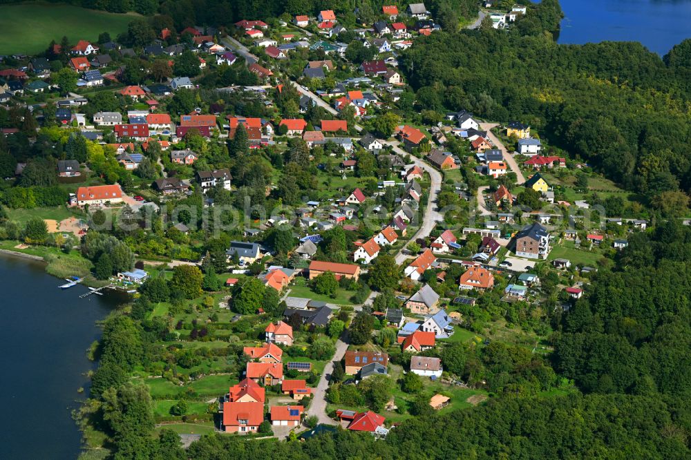 Godern from above - Village on the lake bank areas on street Alte Dorfstrasse in Godern in the state Mecklenburg - Western Pomerania, Germany