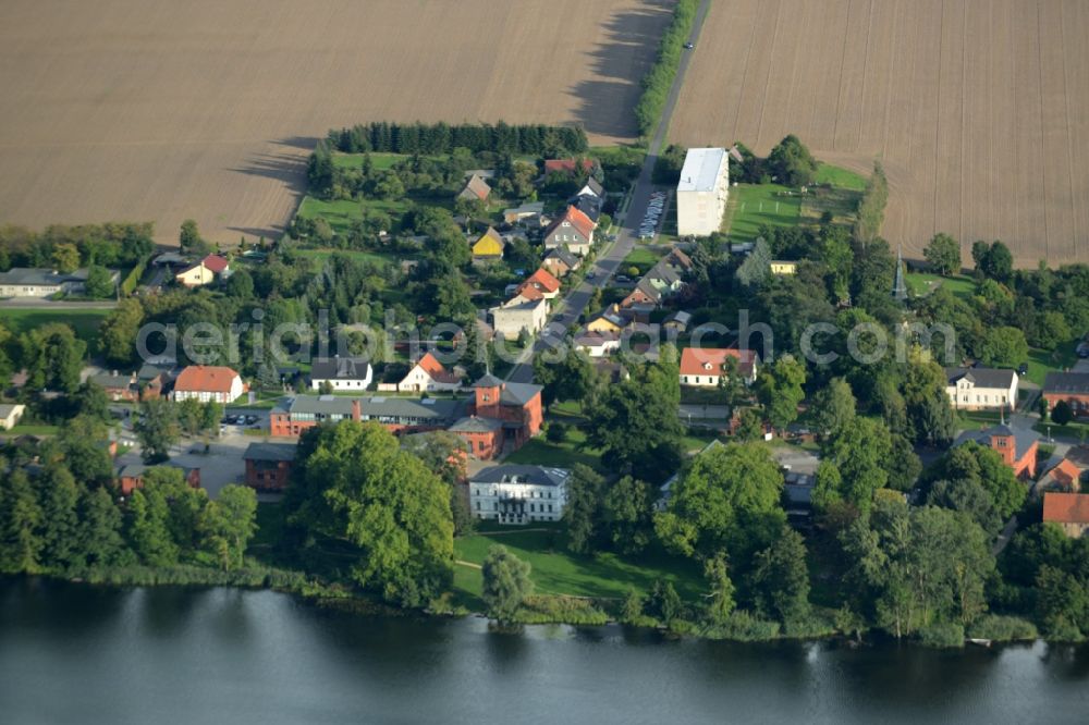 Groß Behnitz from the bird's eye view: Village on the lake bank areas in Gross Behnitz in the state Brandenburg