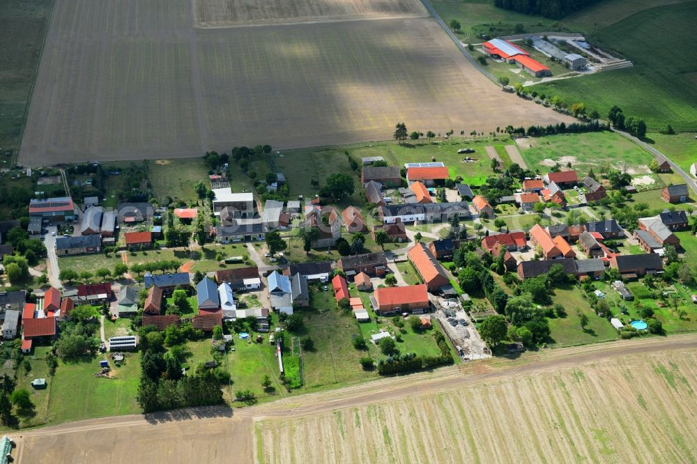 Aerial photograph Söllenthin - Agricultural land and field borders surround the settlement area of the village in Soellenthin in the state Brandenburg, Germany