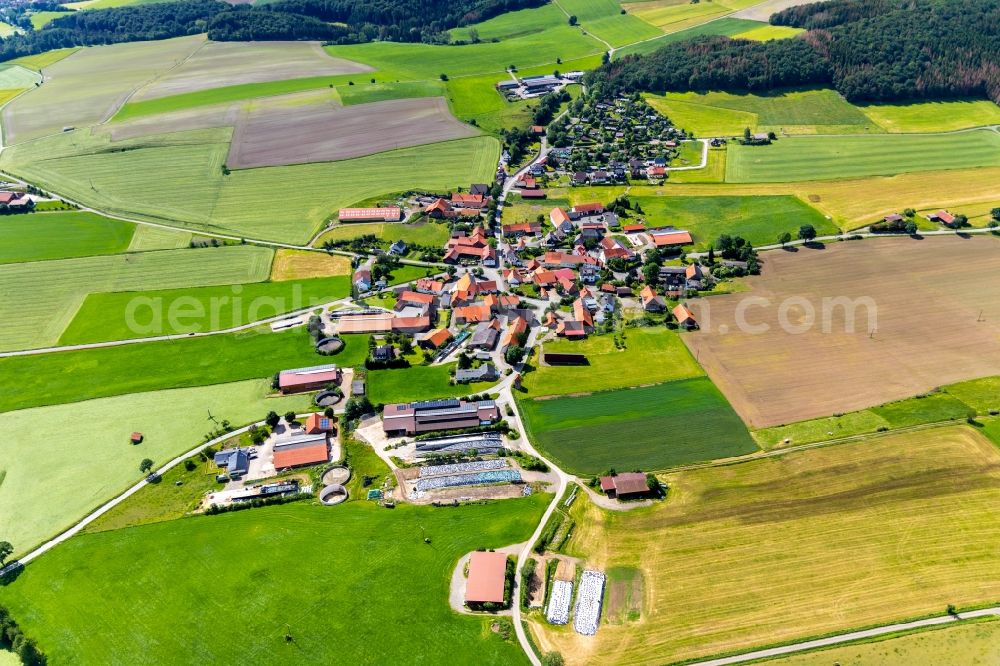 Aerial image Sudeck - Agricultural land and field borders surround the settlement area of the village in Sudeck in the state Hesse, Germany