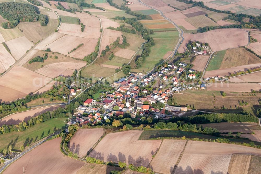 Aerial photograph Theinheim - Agricultural land and field borders surround the settlement area of the village in Theinheim in the state Bavaria, Germany