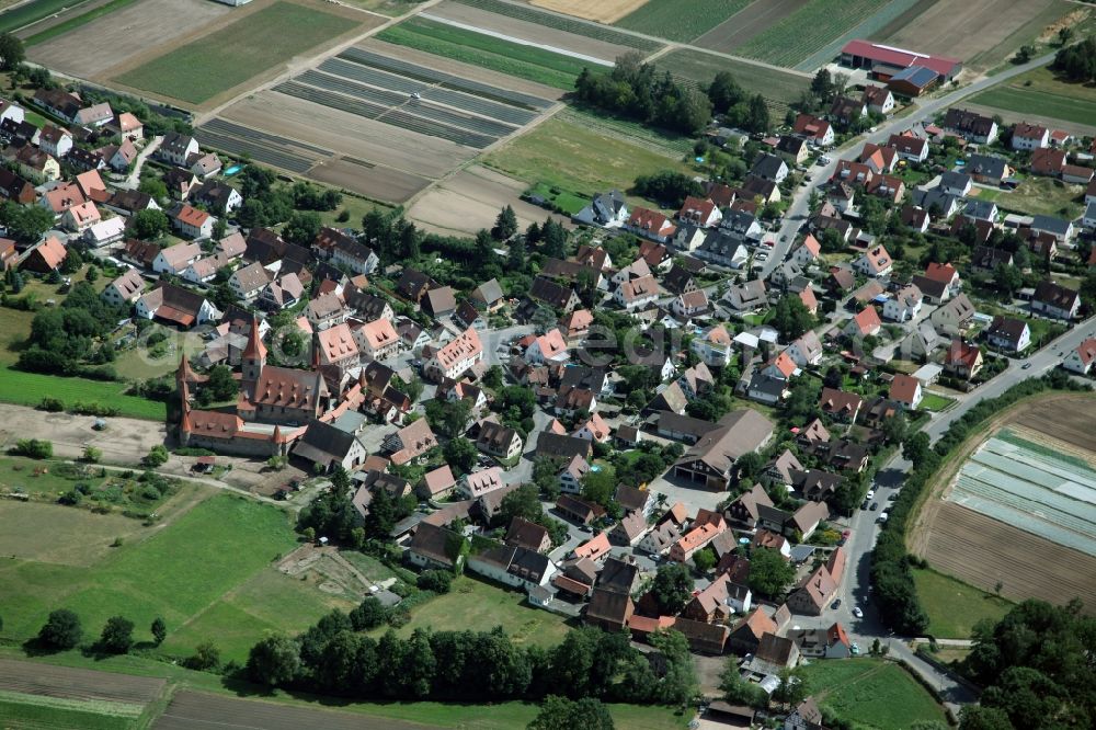 Aerial image Nürnberg - Village center in Nuremberg Kraftshof in Bavaria. Left of center is the Church of St. George with a fortified cemetery. The medieval church (former St. Mary and Holy Cross) is surrounded entirely by a defensive wall with battlements and corner towers