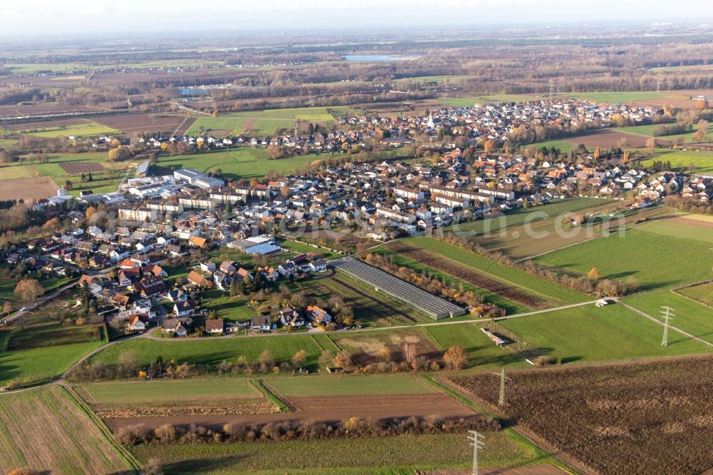 Weitenung from the bird's eye view: Agricultural land and field borders surround the settlement area of the village in Weitenung in the state Baden-Wurttemberg, Germany