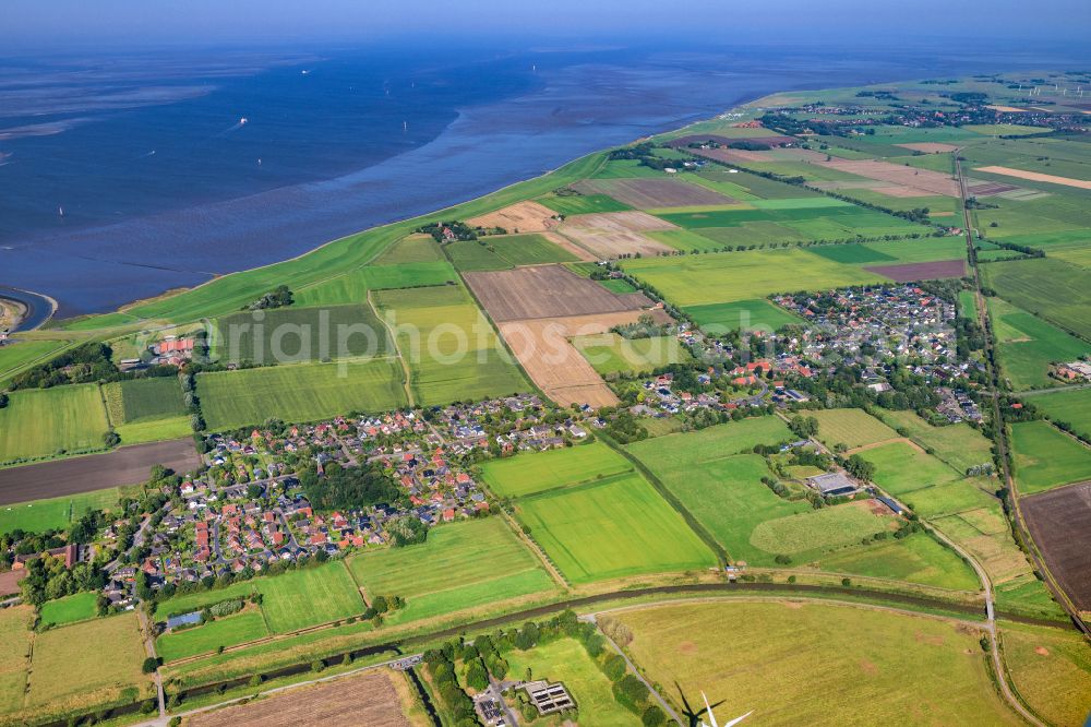 Geestland from the bird's eye view: Village center on the banks of the Weser Imsum in Geestland in the state Lower Saxony, Germany