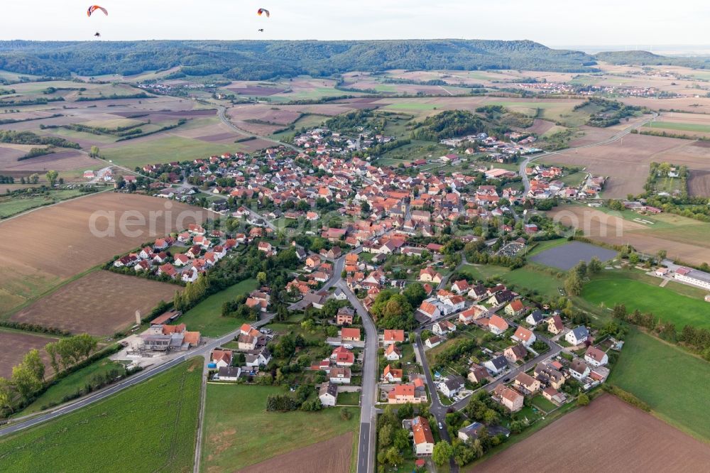 Westheim from above - Agricultural land and field borders surround the settlement area of the village in Westheim in the state Bavaria, Germany