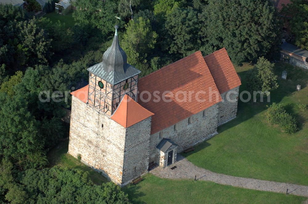 Pretzien from the bird's eye view: Strasse der Romanik: Im westlichen Teil des Ortes Pretzien befindet sich dieser wohlerhaltene romanische Bruchsteinbau aus dem Jahre 1140, wo er durch einen Auftrag des Markgrafen Albrecht des Bären entstand. Pretzien 2007/08/07 The church of St Thomas is a well-preserved Romanesque building of undressed stone dating back to 1140.