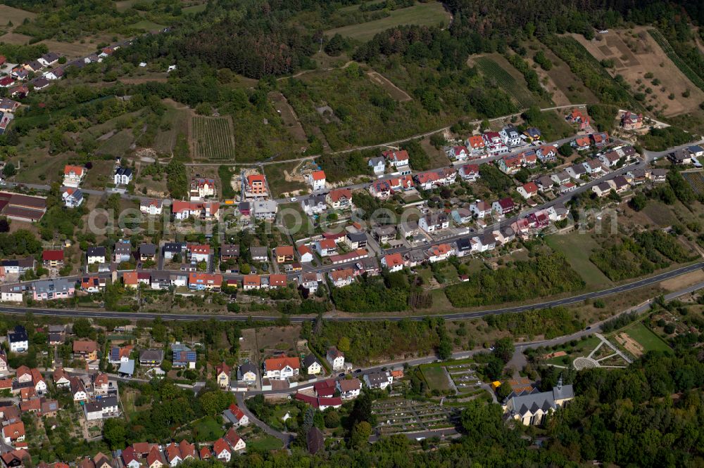 Retzbach from the bird's eye view: Village on the edge of vineyards and wineries in the wine-growing area on street Hauenweg in Retzbach in the state Bavaria, Germany