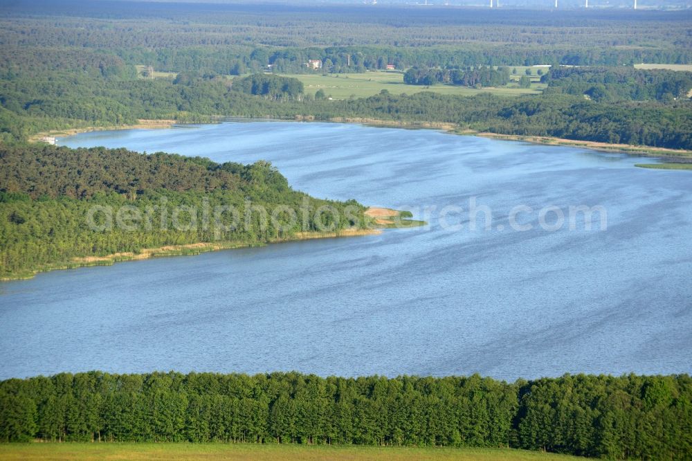 Aerial image Löwenberger Land - Dreetzsee lake in the borough of Loewenberger Land in the state of Brandenburg. The lake is surrounded by trees and forest, the next village is the Grueneberg part of the borough
