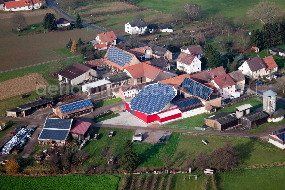 Aerial image Kapellen-Drusweiler - Panel rows of photovoltaic turnable roof of a stable in the district Deutschhof in Kapellen-Drusweiler in the state Rhineland-Palatinate