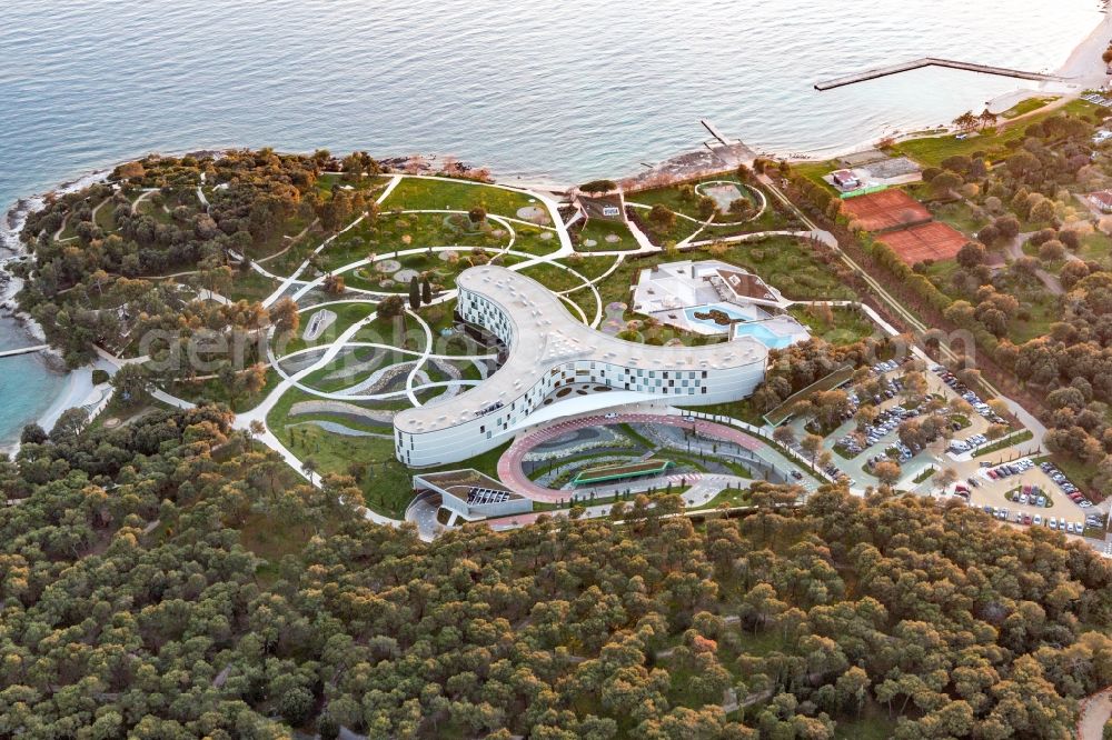 Aerial image Rovinj - Three armes of the of the hotel building and its parc of Family Hotel Amarin at the Adriatic sea in Rovinj in Istirien - Istarska zupanija, Croatia