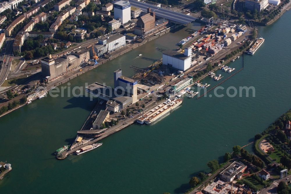 Aerial image Basel - In the middle of the river Rhine the three countries Germany, Switzerland and France merge in Basel in Switzerland. A Pylon is symbolising the location in the harbor area of Basle in Switzerland