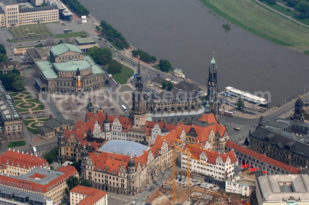 Aerial photograph Dresden - Blick auf das wiederhergestellte Dresdner Schloss , dem Residenzschloss der sächsischen Kurfürsten. Im Hintergrund die touristischen Besuchermagneten Hofkirche, Semperoper und Theaterplatz der sächsischen Metropole. View of the restored Royal Palace, the residence of the Saxon Elector. In the background the tourist attractions for visitors Court Church, Semper Opera and theater space of the Saxon capital.