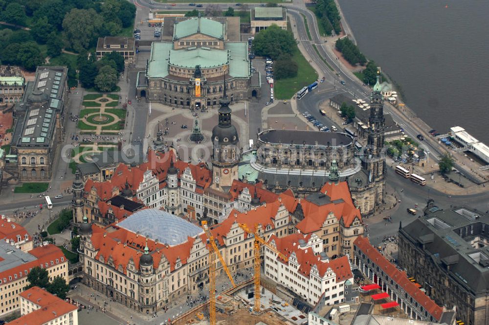 Aerial photograph Dresden - Blick auf das wiederhergestellte Dresdner Schloss , dem Residenzschloss der sächsischen Kurfürsten. Im Hintergrund die touristischen Besuchermagneten Hofkirche, Semperoper und Theaterplatz der sächsischen Metropole. View of the restored Royal Palace, the residence of the Saxon Elector. In the background the tourist attractions for visitors Court Church, Semper Opera and theater space of the Saxon capital.