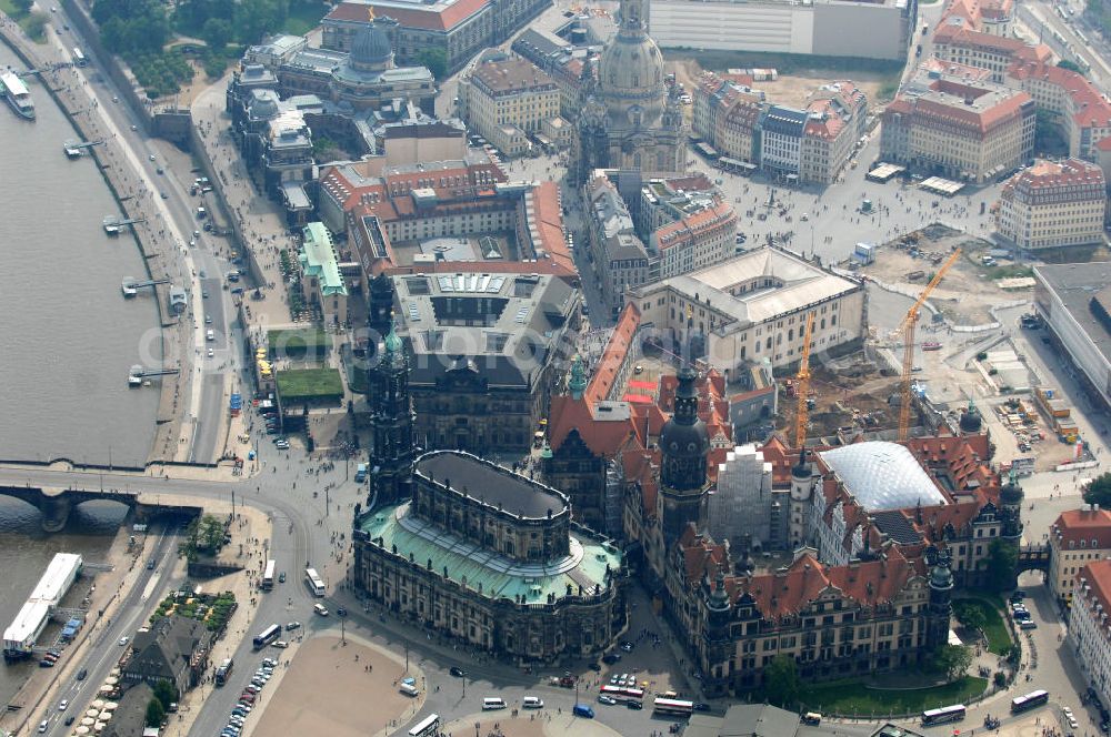 Aerial photograph Dresden - Blick auf das wiederhergestellte Dresdner Schloss , dem Residenzschloss der sächsischen Kurfürsten. Im Hintergrund die touristischen Besuchermagneten Hofkirche, Semperoper und Theaterplatz der sächsischen Metropole. View of the restored Royal Palace, the residence of the Saxon Elector. In the background the tourist attractions for visitors Court Church, Semper Opera and theater space of the Saxon capital.