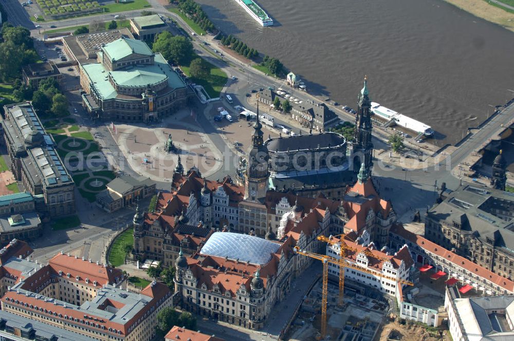 Aerial photograph Dresden - Blick auf das wiederhergestellte Dresdner Schloss , dem Residenzschloss der sächsischen Kurfürsten. Im Hintergrund die touristischen Besuchermagneten Hofkirche, Semperoper und Theaterplatz der sächsischen Metropole. View of the restored Royal Palace, the residence of the Saxon Elector. In the background the tourist attractions for visitors Court Church, Semper Opera and theater space of the Saxon capital.