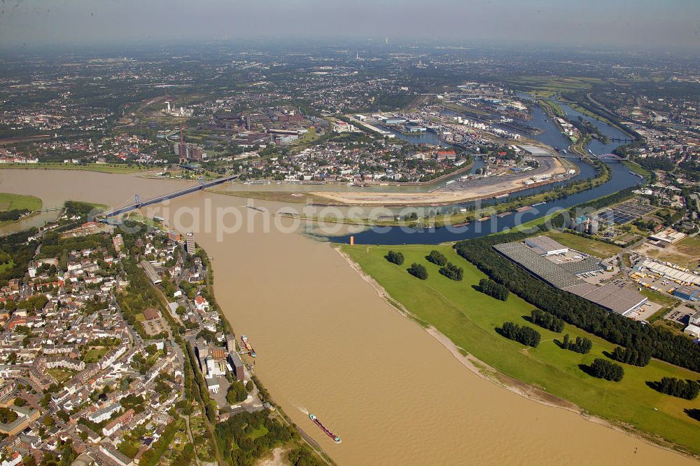 Aerial image Duisburg - Blick auf den Stadtteil Duisburg-Ruhrort bei Hochwasser. Das Hochwasser aus dem Alpenraum erreicht über den Rhein Nordrhein-Westfalen. Auf dem Bild ist deutlich zu erkennen wie sich das braune Rheinwasser an der Mündung der Ruhr bei Duisburg-Ruhrort mit dem sauberen Ruhrwasser mischt. View of the district of Duisburg-Ruhrort at high tide. The flood water from the Alps reached the Rhine of North Rhine-Westphalia. In the picture it is clearly visible how the brown water is mixed at the mouth of the Rhine at Duisburg-Ruhrort with the clean water of the Ruhr.