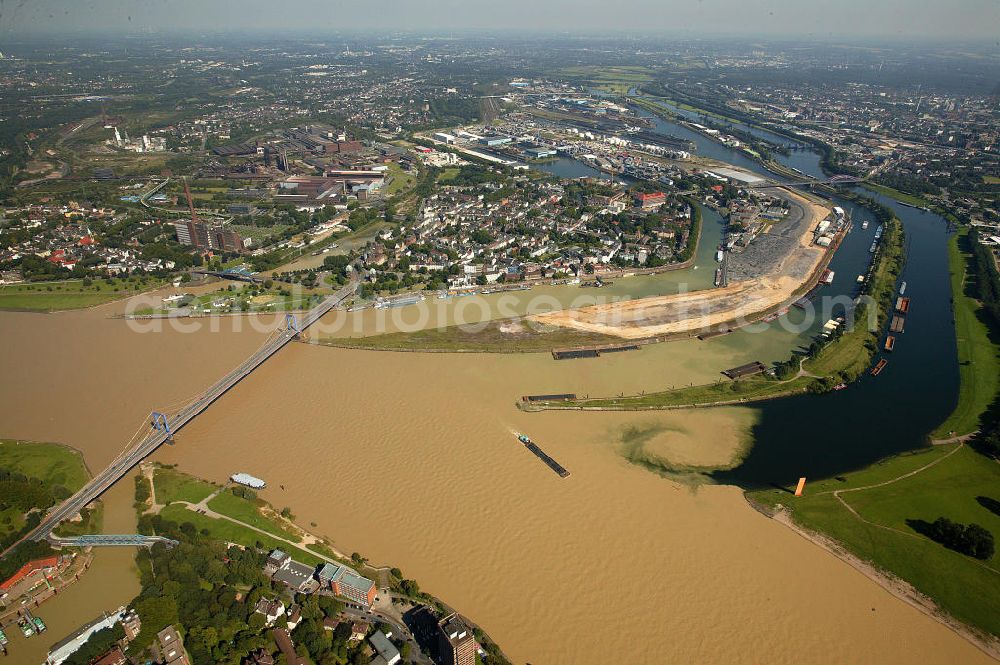 Aerial image Duisburg - Blick auf den Stadtteil Duisburg-Ruhrort bei Hochwasser. Das Hochwasser aus dem Alpenraum erreicht über den Rhein Nordrhein-Westfalen. Auf dem Bild ist deutlich zu erkennen wie sich das braune Rheinwasser an der Mündung der Ruhr bei Duisburg-Ruhrort mit dem sauberen Ruhrwasser mischt. View of the district of Duisburg-Ruhrort at high tide. The flood water from the Alps reached the Rhine of North Rhine-Westphalia. In the picture it is clearly visible how the brown water is mixed at the mouth of the Rhine at Duisburg-Ruhrort with the clean water of the Ruhr.