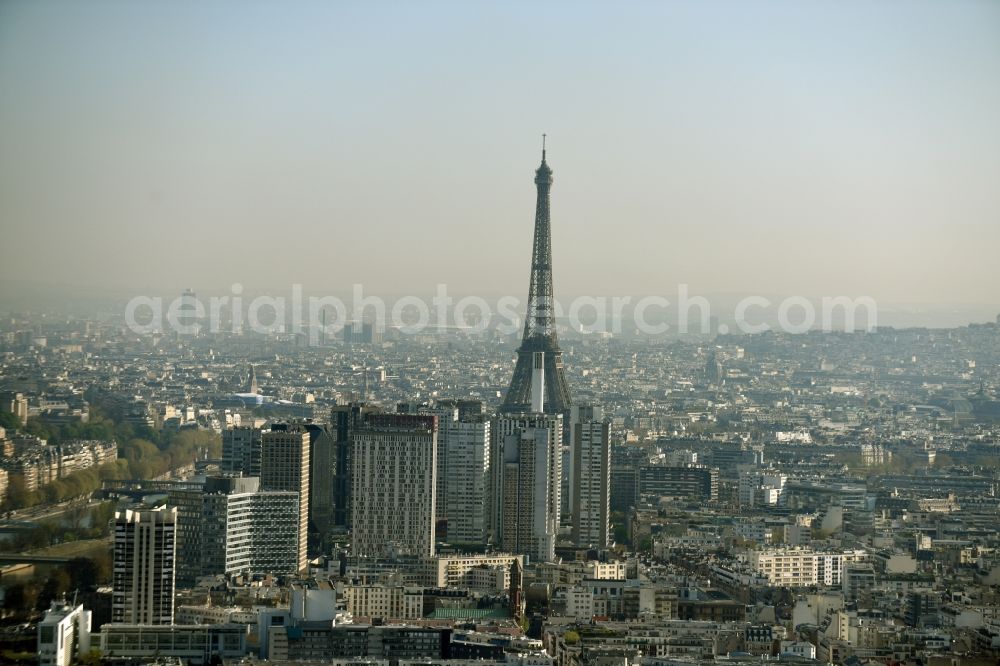 Paris from the bird's eye view: Haze and smog weather conditions at the Eiffel Tower Eiffel Tour the landmark in Paris in Ile-de-France, France