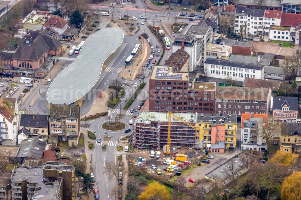 Herne from above - Construction site for the new residential and commercial Corner house - building on Bahnhofplatz corner Bahnhofstrasse in Herne in the state North Rhine-Westphalia, Germany