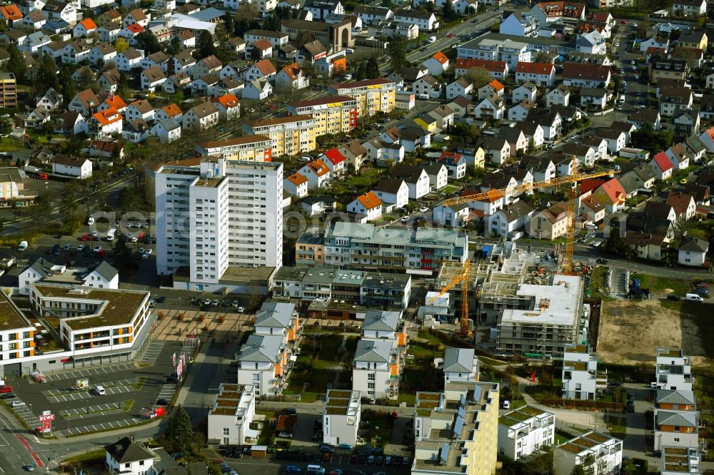 Aerial photograph Heusenstamm - Construction site for the new residential and commercial Corner house - building on Leibnitzstrasse in Heusenstamm in the state Hesse, Germany