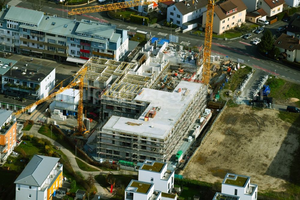 Heusenstamm from the bird's eye view: Construction site for the new residential and commercial Corner house - building on Leibnitzstrasse in Heusenstamm in the state Hesse, Germany