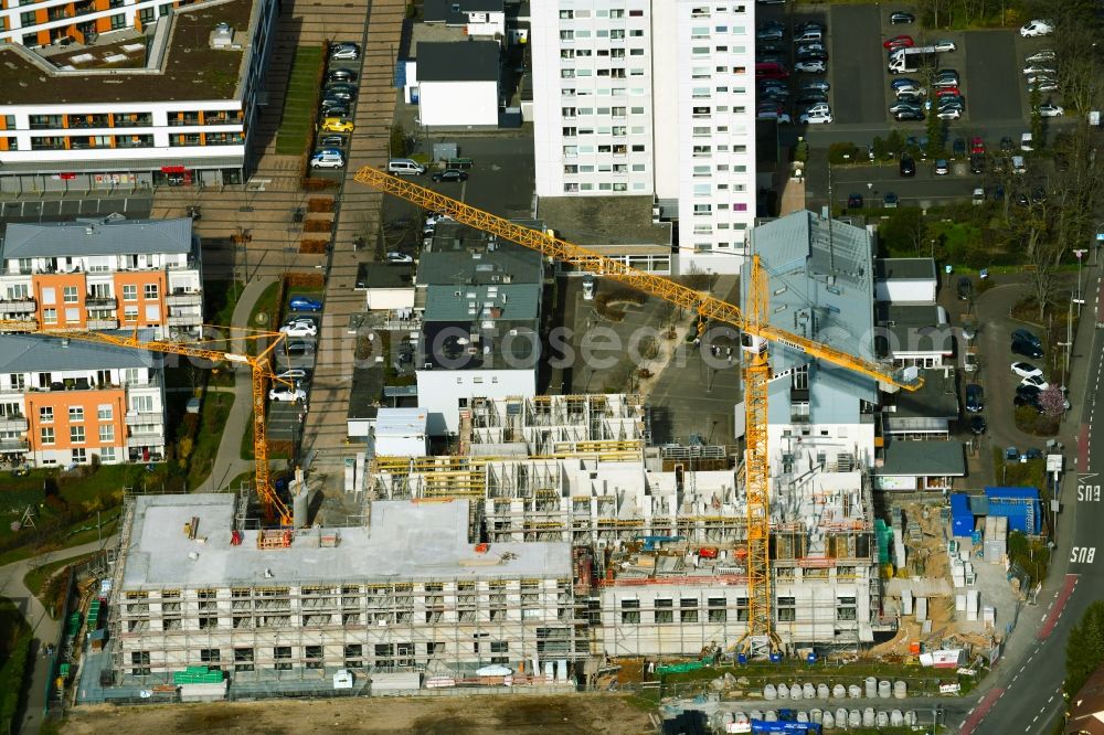 Aerial image Heusenstamm - Construction site for the new residential and commercial Corner house - building on Leibnitzstrasse in Heusenstamm in the state Hesse, Germany