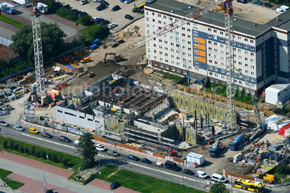 Berlin from above - Construction site for the new residential and commercial Corner house - building on Marzahner Chaussee Ecke Allee of Kosmonauten in the district Marzahn in Berlin, Germany