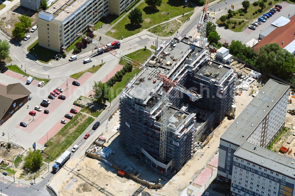 Berlin from above - Construction site for the new residential and commercial Corner house - building on Marzahner Chaussee Ecke Allee of Kosmonauten in the district Marzahn in Berlin, Germany