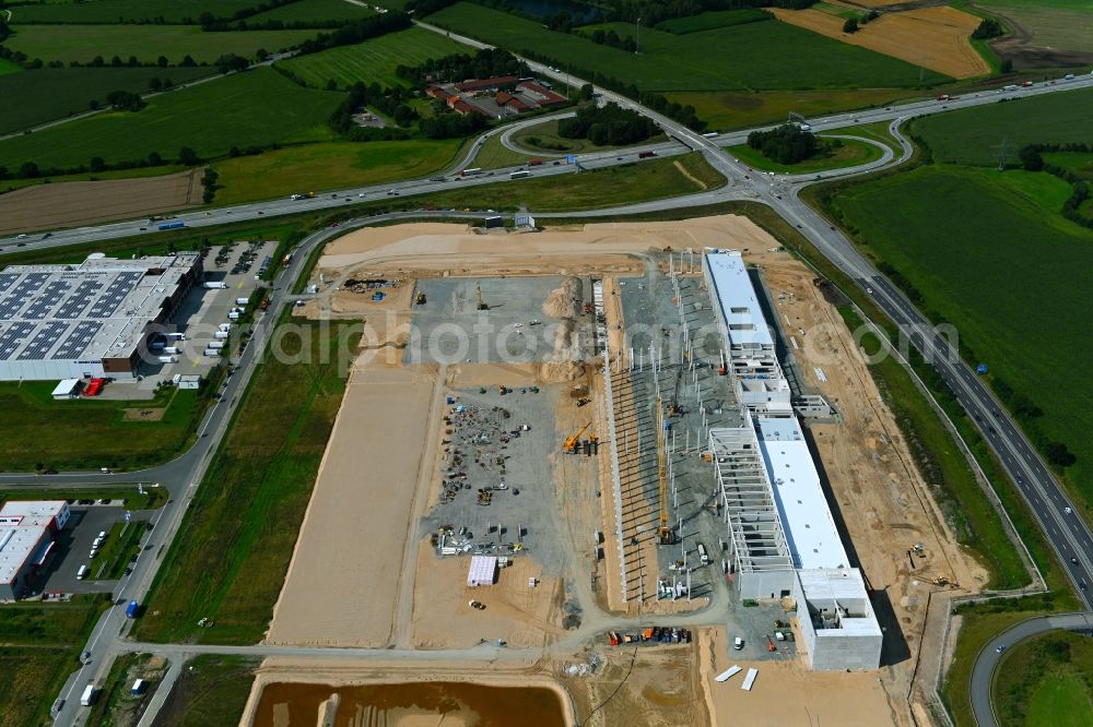 Neumünster from the bird's eye view: EDEKA - Construction site for a warehouse and forwarding building with Frischelager on Eichhofpark in Neumuenster in the state Schleswig-Holstein, Germany