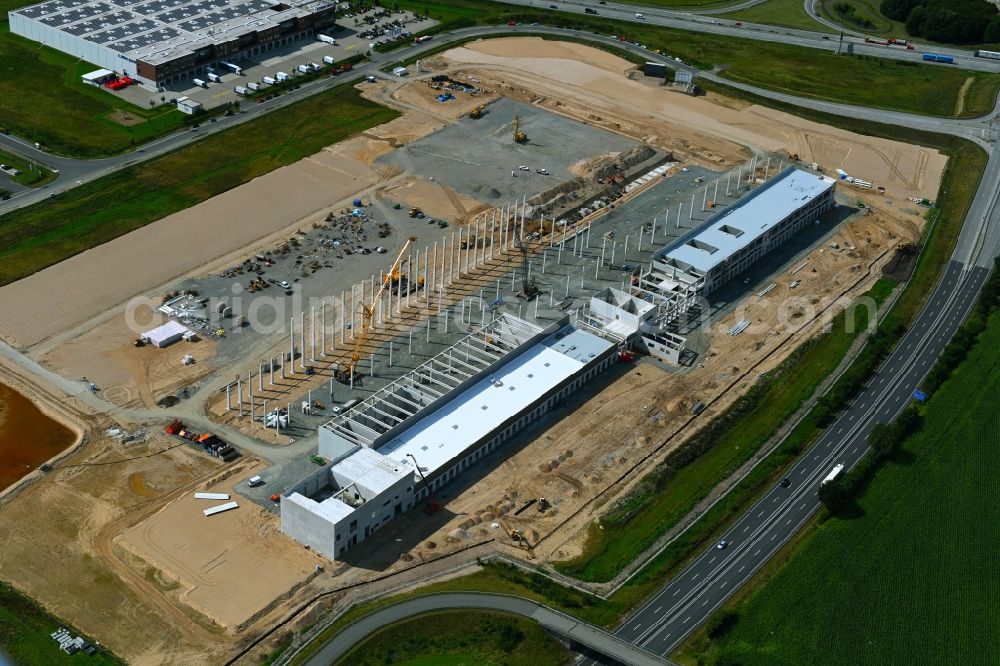 Aerial photograph Neumünster - EDEKA - Construction site for a warehouse and forwarding building with Frischelager on Eichhofpark in Neumuenster in the state Schleswig-Holstein, Germany