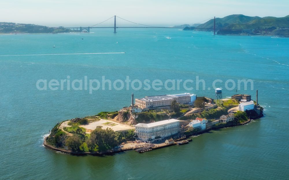 Aerial photograph San Francisco - Former correctional prison facility Alcatraz Island on street Pier 39 in San Francisco in California, United States of America