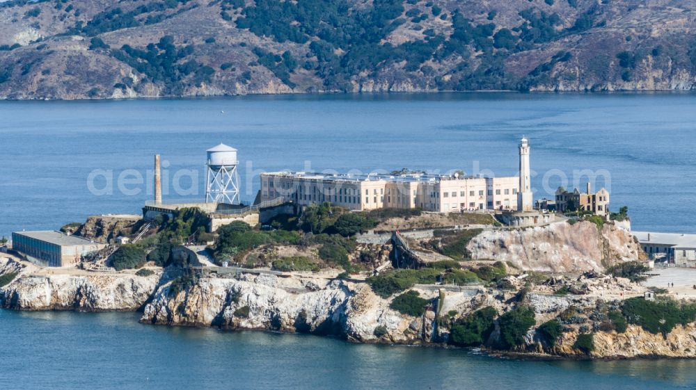 Aerial photograph San Francisco - Former correctional prison facility Alcatraz Island on street Pier 39 in San Francisco in California, United States of America