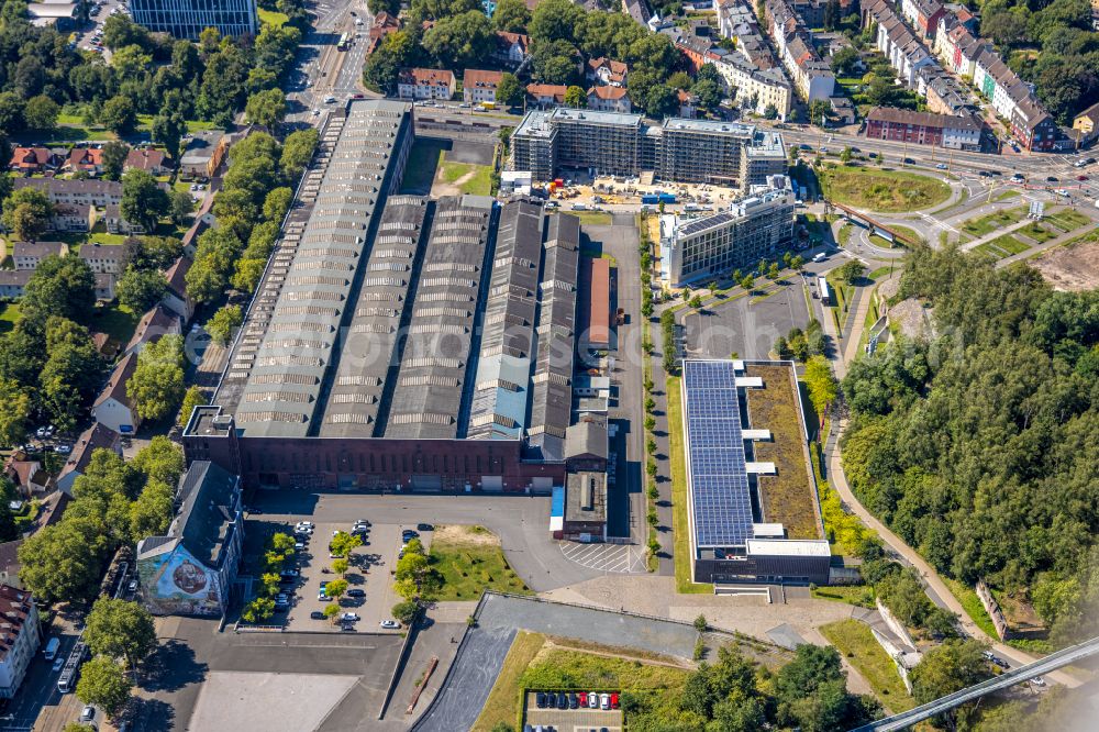 Bochum from the bird's eye view: Former Mechanischen Werkstaetten des Bochumer Vereins. Today as a warehouse used by the thyssenkrupp AG factory building along the Alleestrasse in Bochum in North Rhine-Westphalia, Germany. Since 2003, the factory building and the adjacent administrative building are listed buildings