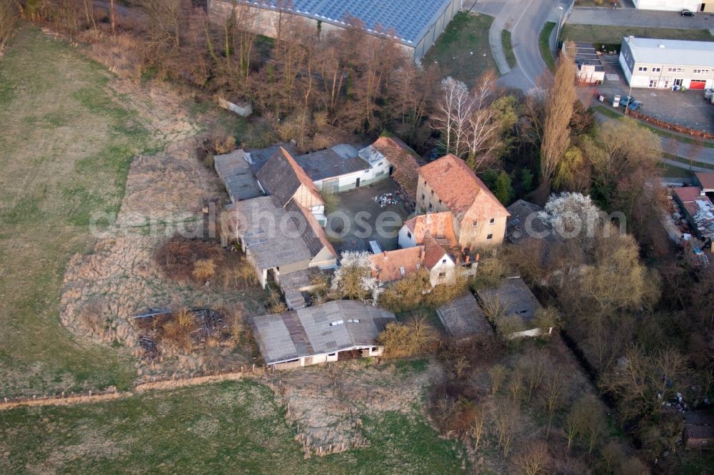 Aerial image Kandel - Former mill on a farm homestead on the edge of cultivated fields in Kandel in the state Rhineland-Palatinate