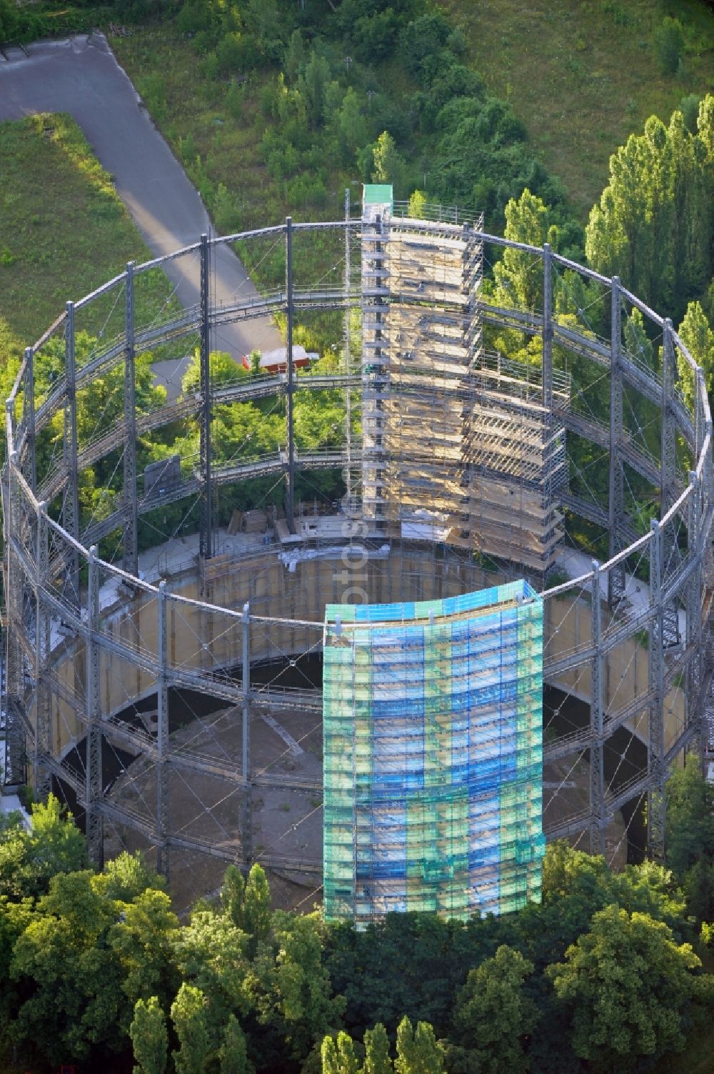 Berlin from above - View of a former gasometer on the closed down GASAG area at the Lankwitzer Street in Berlin-Mariendorf