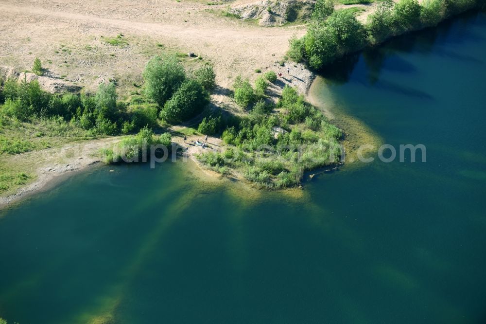 Aerial photograph Malente - Groundwater lake of the former open pit mine in Malente in the state of Schleswig-Holstein, Germany