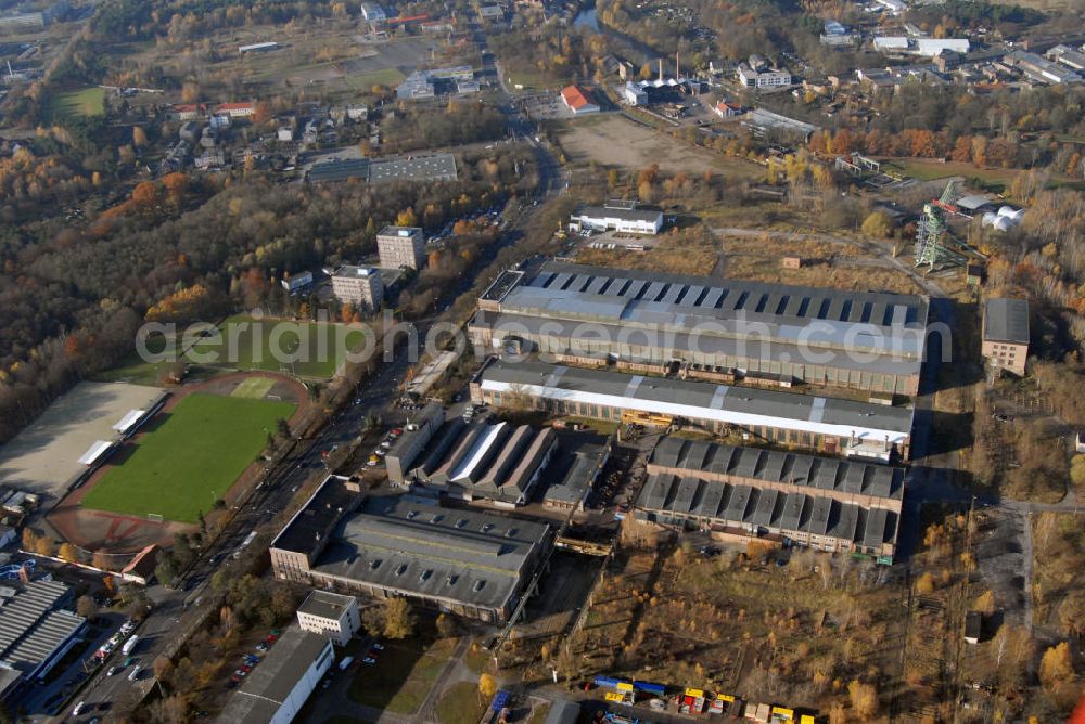 Eberswalde from the bird's eye view: Blick auf das Gelände des ehemalgien VEB Kranbau in Eberswalde. Eberswalde ist die Kreisstadt des Landkreises Barnim. Die Waldstadt war bis zur Wende bekannt für Industrielle Großbetriebe, wie die Papierfabrik, das Walzwerk und an dere Großbetriebe. Der Kranbau Eberswalde ging nach dem Zweiten Weltkrieg aus den Ardelt-Werken hervor. Hafenkräne aus Eberswalde waren qualitativ hochwertig und zudem verhältnismäßig preisgünstig. Die Devisenbringer der DDR stehen heute noch auf Kreta, Rio de Janeiro, Hamburg und St. Petersburg. Nach verschiedenen Übernahmen ist der Betrieb seit 1997 Bestandteil der Kirow Leipzig AG. Kontakt: KIROW Leipzig KE Kranbau Eberswalde AG, Betriebssstätte Eberswalde, Frau Braunholz, Heegermühler Str. 64, 16225 Eberswalde, marita.braunholz@kranbau-eberswalde.de,