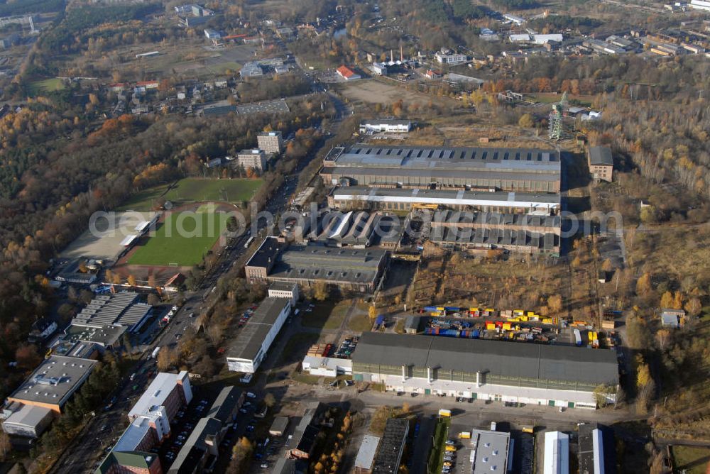 Aerial image Eberswalde - Blick auf das Gelände des ehemalgien VEB Kranbau in Eberswalde. Eberswalde ist die Kreisstadt des Landkreises Barnim. Die Waldstadt war bis zur Wende bekannt für Industrielle Großbetriebe, wie die Papierfabrik, das Walzwerk und an dere Großbetriebe. Der Kranbau Eberswalde ging nach dem Zweiten Weltkrieg aus den Ardelt-Werken hervor. Hafenkräne aus Eberswalde waren qualitativ hochwertig und zudem verhältnismäßig preisgünstig. Die Devisenbringer der DDR stehen heute noch auf Kreta, Rio de Janeiro, Hamburg und St. Petersburg. Nach verschiedenen Übernahmen ist der Betrieb seit 1997 Bestandteil der Kirow Leipzig AG. Kontakt: KIROW Leipzig KE Kranbau Eberswalde AG, Betriebssstätte Eberswalde, Frau Braunholz, Heegermühler Str. 64, 16225 Eberswalde, marita.braunholz@kranbau-eberswalde.de,