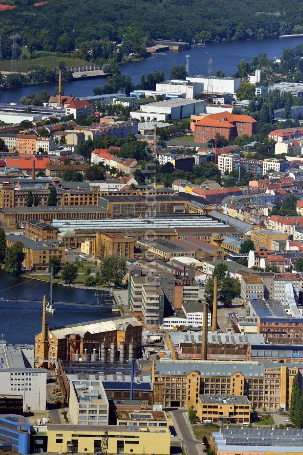 Berlin from above - Former Industrieglände with the building of the Academy of Technology and Economics, the workshops of Stephanus- Werkstätten and the Stabilke on the banks of the River Spree in Berlin Schoeneweide